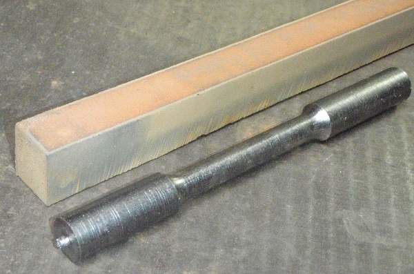 dumbbell sample before and after turning on the lathe