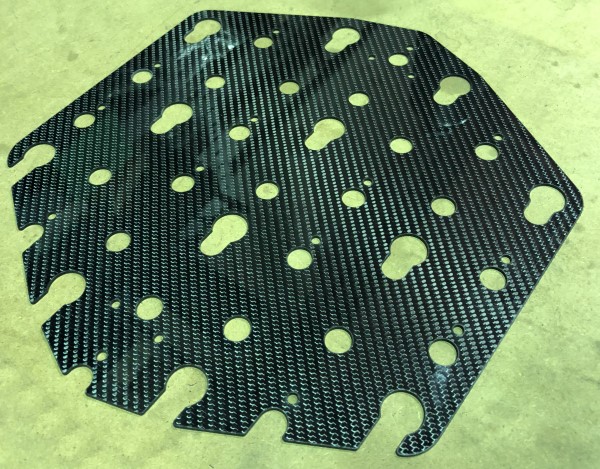 Carbon fibre parts waterjet cut from carbon fibre sheet and foam-cored carbon fibre sheet