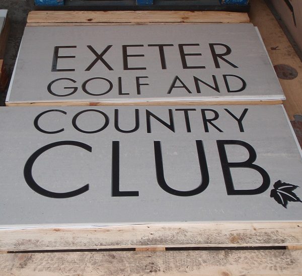 Inlaid ceramic and porcelain tile features for entrances logos and signs