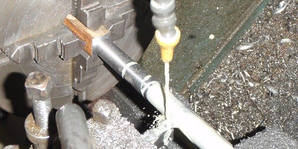 machining cast iron Pipe sections into dumbells on the lathe machining cast iron Pipe sections into dumbells on the lathe